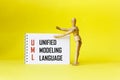 UML - Unified Modeling Language acronym, technology concept background