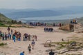 UMM QAIS, JORDAN - MARCH 30, 2017: Tourists visit the viewpoint of Sea of Galilee at the ruins of Umm Qa