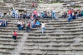 UMM QAIS, JORDAN - MARCH 30, 2017: Tourists visit the West Theatre ruins in Umm Qa