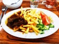 Ummy fries and beef Royalty Free Stock Photo
