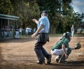 Umpire calling player out at home base Royalty Free Stock Photo