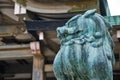 Un-gyo  Komainu lion-dog guarding the entrance of Hokoku Shrine. Osaka Castle. Japan Royalty Free Stock Photo