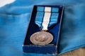 UN Peacekeeper`s medal and service ribbon in a box