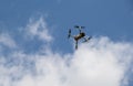 Un undefined air drone flying in the blue sky