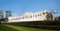 UN United Nations general assembly building with world flags fly Royalty Free Stock Photo