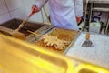 Unacquainted chinese Chef Cooking local cuisine Fried octopus on wangfujing Walking street in beijing city Royalty Free Stock Photo