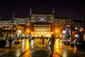 :Unacquainted Chinese people or tourist walking in evening time at Zhengyang Gate Jianlou Qianmen street Royalty Free Stock Photo