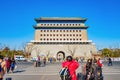 Unacquainted Chinese people or tourist walking near Zhengyang Gate Jianlou at Qianmen street Royalty Free Stock Photo