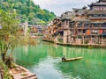 Unacquainted local chinese people on the boat in fenghuang old town Royalty Free Stock Photo