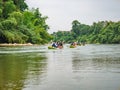 Unacquainted tourist kayaking on namsong river at vangvieng city Laos.