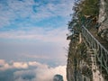 Unacquainted Tourists on Glass Cliff walk in tianmen mountain at Zhangjiajie city china Royalty Free Stock Photo