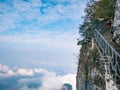 Unacquainted Tourists on Glass Cliff walk in tianmen mountain at Zhangjiajie city china. Royalty Free Stock Photo