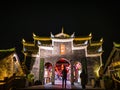 Unacquainted toursit walk on the bridge cross the river of fenghuang old town