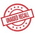 UNAIDED RECALL text written on red vintage round stamp Royalty Free Stock Photo