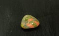 Unakite pebbles green epidote natural mineral stone from Republic of South Africa RSA. Mineralogy, geology, magic of