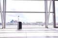 Unattended Suitcase Posing Security Threat In Airport Building Royalty Free Stock Photo