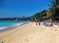 View on tropical beach lagoon with waves and palm trees Royalty Free Stock Photo