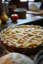 Unbaked apple pie in a baking dish wrapped in cloth