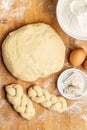 Unbaked braided bun dough. Raw dough Royalty Free Stock Photo