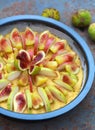 Unbaked Tart with figs and pears with cornmeal, Selective focus Royalty Free Stock Photo