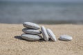 Unbalanced stones on beach Royalty Free Stock Photo