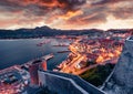Unbelievable evening cityscape of Calvi port. Gorgeous summer sunrise on Corsica island, France, Europe. Exciting seascape of Medi