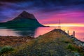 Unbelievable evening view of Kirkjufell peak on background.