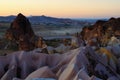 Unbelievable landscape of shaped sandstone rocks duringt sunset. Typical geologic formations of Cappadocia Royalty Free Stock Photo