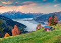 Unbelievable morning scene of Zell lake. Great autumn sunrise view of Austrian town - Zell am See, south of the city of Salzburg.