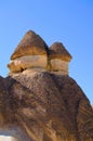 Unbelievable nature landscape of shaped sandstone rocks against blue sky. Famous Fairy Chimneys or Multihead stone mushrooms