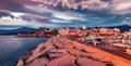 Unbelievable sunset on Corsica island. Dramatic summer seascape of Mediterranean sea. Fantastic evening cityscape of Saint-Florens