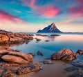 Unbelievable sunset with Tavolara mountain on background. Wonderful summer seascape of Mediterranean Sea, Porto Taverna beach, Sar Royalty Free Stock Photo