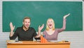 That is unbelievable. University students gesturing. High school education. Couple studying in classroom. Man and woman Royalty Free Stock Photo
