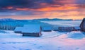 Unbelievable winter sunrise in mountain village. Royalty Free Stock Photo