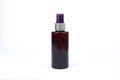 Unbranded brown cosmetic spray bottle isolated on white background. Natural organic spa cosmetics, Spray concept. Body mist, brume