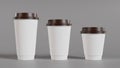 Unbranded paper coffee glasses of three sizes. 3D rendering illustration.