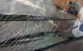 Unbreakable frontal glass damaged by crash in a public transport