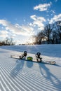 Unbroken ski slope, snowboard and goggles Royalty Free Stock Photo