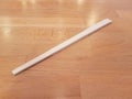 unbroken wood chopsticks on brown wood table