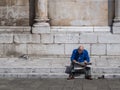 Uncaring old man reading Royalty Free Stock Photo