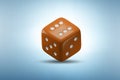 Uncertainty concept with dice standing on its edge - 3d rendering Royalty Free Stock Photo