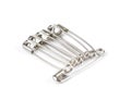 Unch of safety pins on white background, shiny metal safety pin Royalty Free Stock Photo