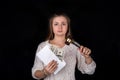 Unchained woman holding gavel and envelope with money