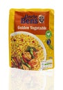 Uncle Bens Golden Vegtable rice packet on a white backgroun