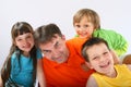 Uncle with nephews and niece Royalty Free Stock Photo