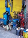 Unclean and messy corner inside an auto repair workshop