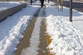Uncleaned from snow, icy sidewalk Royalty Free Stock Photo