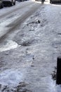 Uncleaned from snow, icy sidewalk Royalty Free Stock Photo