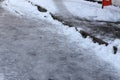 Uncleaned from snow, icy sidewalk Royalty Free Stock Photo