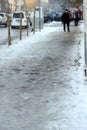 Uncleaned from snow, icy sidewalk Royalty Free Stock Photo